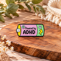 Powered by ADHD – Colourful Battery Neurodiversity Awareness Enamel Pin Badge