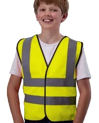 Child wearing a yellow safety vest 